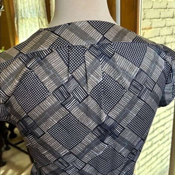 Elegant Black and White Wrap Dress - Picture 9 of 11